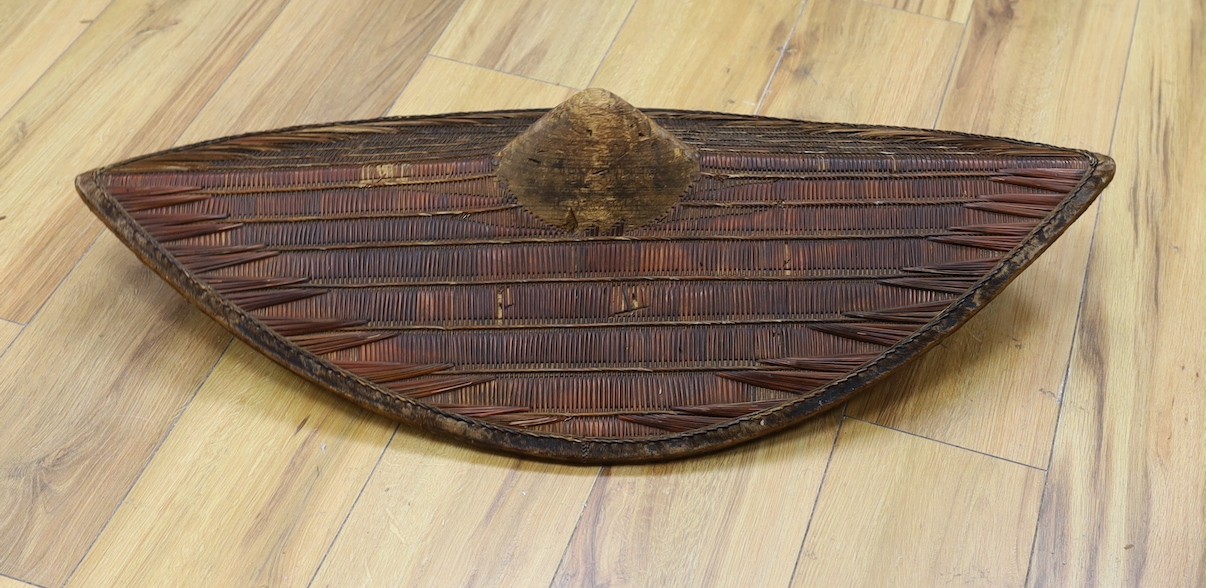 A Ugandan wicker shield, Soga or Ganda, 83cm